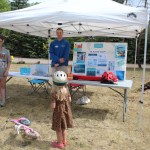 Kadence and Levi from the Bulkley Valley Pool educate people in Telkwa about drowning prevention during National Drowning Prevention Week.