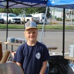 Smithers Fire Rescue's Fire Chief Alle Jan de Vries' son Sijtse de Vries mans the BBQ.