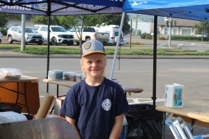 Smithers Fire Rescue's Fire Chief Alle Jan de Vries' son Sijtse de Vries mans the BBQ.