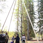 Staff of Horse Lake Elementary School work together to build a teepee at Horse Lake Elementary School. (Patrick Davies photo - 100 Mile Free Press)