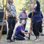 Staff and students of Horse Lake Elementary School work together to construct a teepee on Wednesday, Sept. 17. (Patrick Davies photo - 100 Mile Free Press)