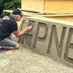 Langley-based sand artist Bruce Waugh creates a PNE sculpture at the fair site in Vancouver on Aug. 14, 2025.