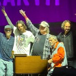 Neil Young and his Chrome Hearts band wave to the crowd at the end of their concert at Deer Lake Park in Burnaby on Saturday, Sept. 6, 2025.