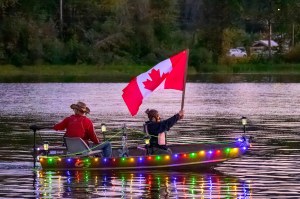 This photo shows a boat from the 2024 Light Up The Lake festival. The 2025 festival is set to feature a concert with local rock bands.