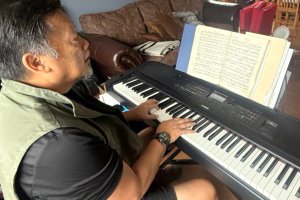 Michael Briones, trying to polish Friedrich Kuhlau's 'Sonatina Op.55.'