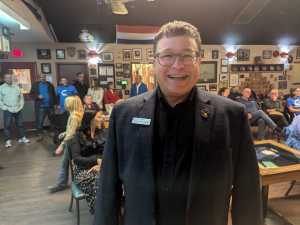 Sheldon Clare celebrates his victory among supporters at the Quesnel Legion Branch.