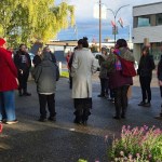 Supporters gather outside court with drumming and singing on Oct. 16, ahead of sentencing submissions.