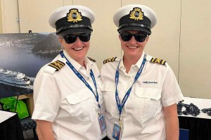 Senior Captain Lori Bartlett-Tribbeck and Senior Chief Engineer Jodi Bartlett-Gaude in their dress uniforms.