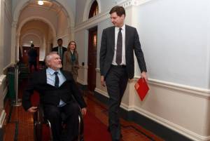 Premier David Eby walks with newly elected MLA for Juan de Fuca-Malahat Dana Lajeunesse as they make their way into the legislative assembly for the oath ceremony at the legislature in Victoria, Wednesday, Nov. 13, 2024. (THE CANADIAN PRESS/Chad Hipolito)
