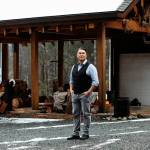 Artist Gordon Dick stands in front of Ahtsik Native Art Gallery. (Melissa Renwick)