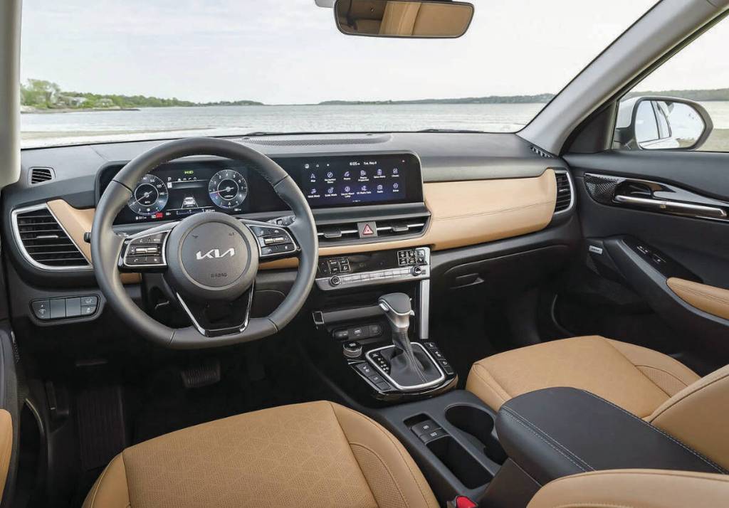 The dashboard of the Seltos has a single panel containing key driver’s information and analog-style gauges. There’s an available 10.25-inch infotainment display with standard Apple CarPlay and Android Auto connectivity. PHOTO: KIA