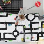 The Road Map Duvet and Pillowcase Set features a maze of roads, roundabouts and vehicle illustrations to fill their imaginations.