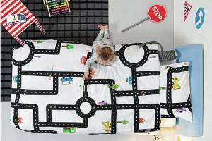 The Road Map Duvet and Pillowcase Set features a maze of roads, roundabouts and vehicle illustrations to fill their imaginations.