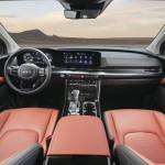 The gauges and touch-screen are contained within a thin panel that stands apart  but is set into  the dash. Passenger room is similar to that of other minivans, but the Carnival has more cargo capacity. PHOTO: KIA
