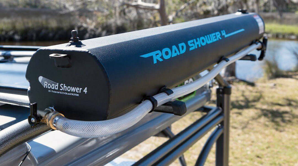 The Road Shower holds 26 litres of water and attaches to your vehicle’s roof rack. Photo courtesy Wheelbase Media