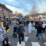 Hundreds gather in Oak Bay Avenue for the Trick or Treat on the Avenue event. (Black Press file photo)