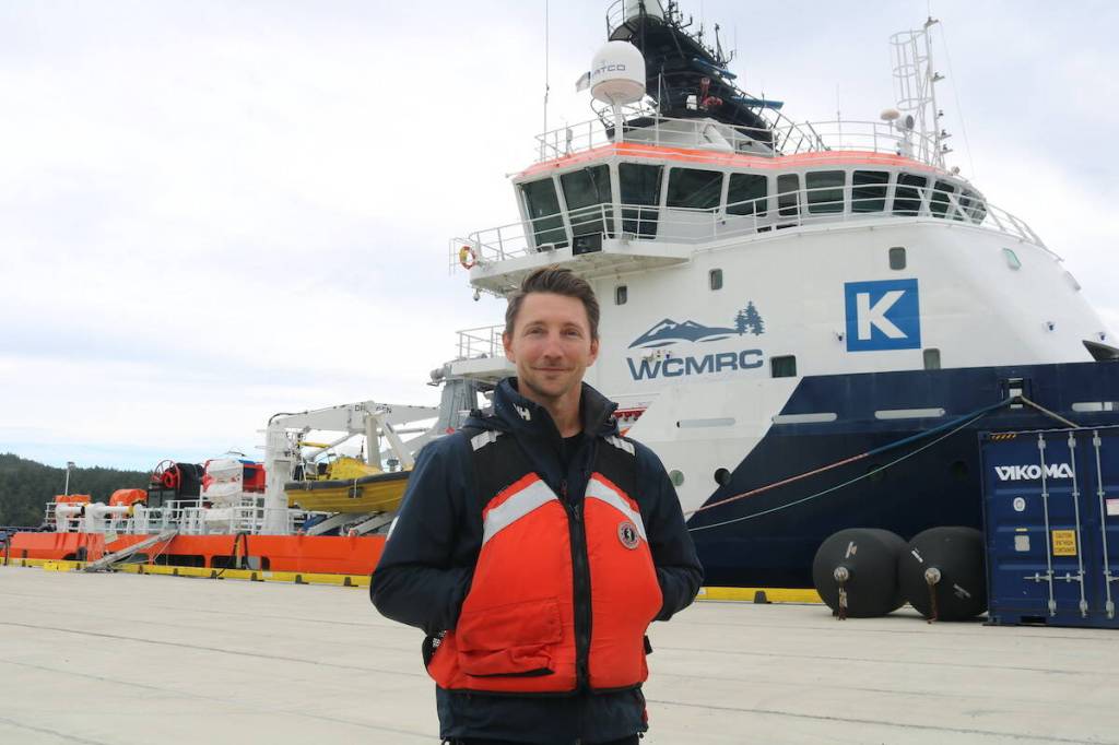 Operations base manager Kyle Hujdic at Beecher Bay spill response centre, stands in front of the K.J. Gardner, the largest spill response vessel in Canada. (Ben Fenlon/Sooke News Mirror)