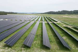 An aerial view of the quA-ymn solar project in Highland Valley, taken in August 2025, shows some of the 39,000 solar panels at the site. (BluEarth Renewables)