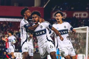 Ralph Priso (#6) and other Whitecaps players celebrate Priso’s late goal to tie Game 2 with FC Dallas in Texas on Saturday, Nov. 1. (Facebook/Whitecaps)