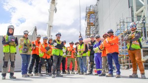 Members of the Outside Battery Limits Closure Weld Team following completion of the final weld on the first production train at the LNG Canada project, in Kitimat.