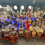Bottles of whisky on a lounge shelf at Skye Avenue Kitchen & Lounge in Surrey.